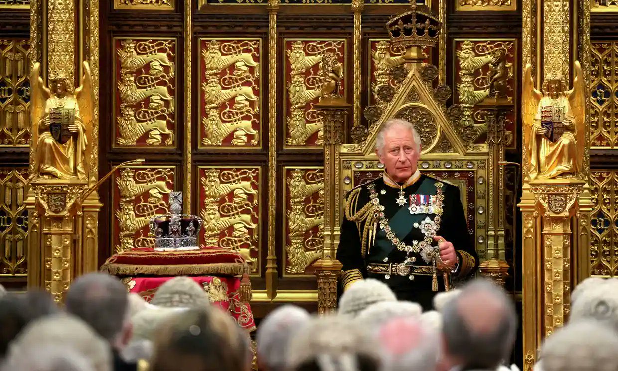 Charles sits on a gold throne for the Queen's Speech